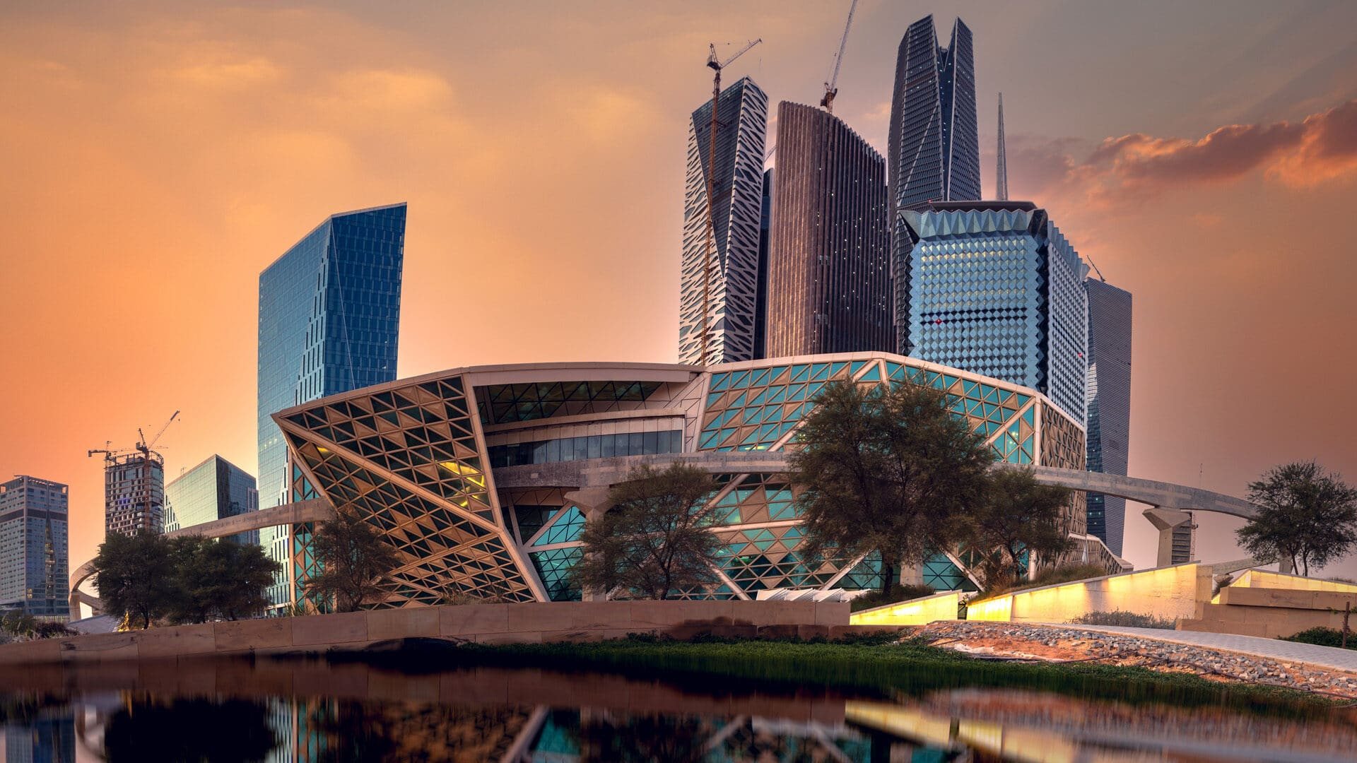 The King Abdullah Financial District, Riyadh, at dusk, with the KAFD Conference Centre in the foreground.
